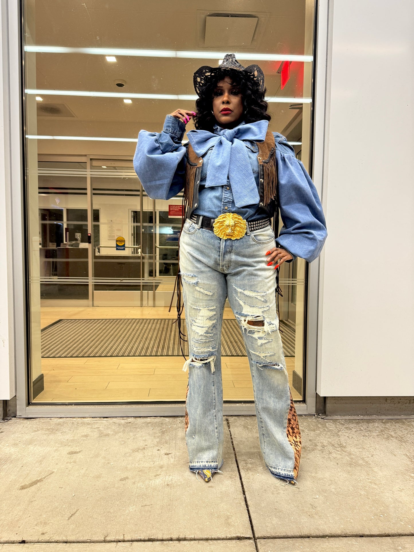 Distressed Denim Snakeskin Flare Jeans