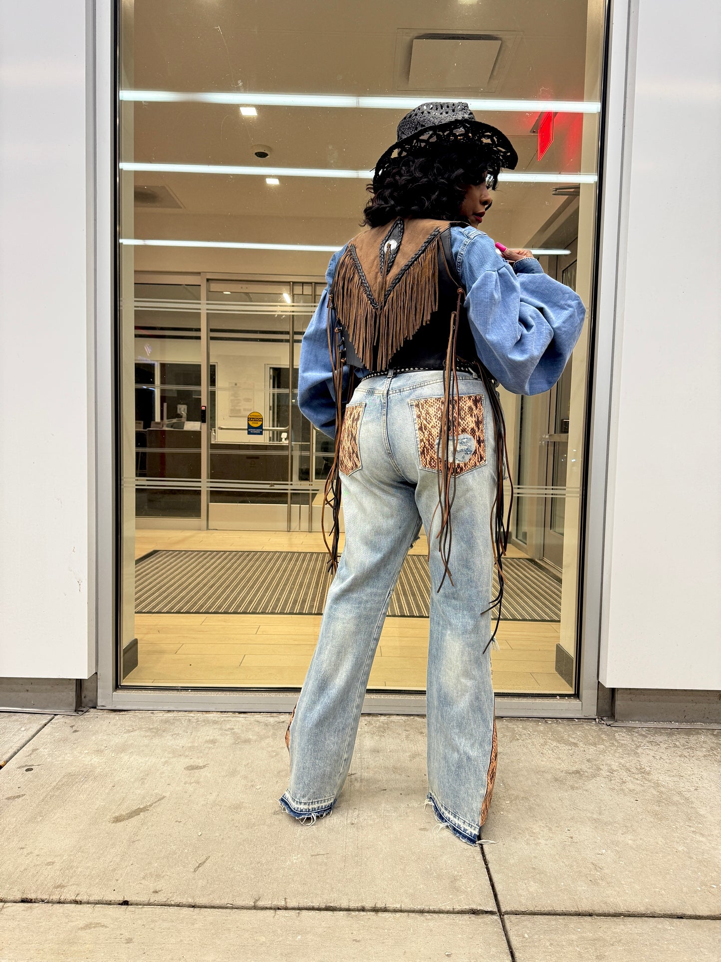 Distressed Denim Snakeskin Flare Jeans